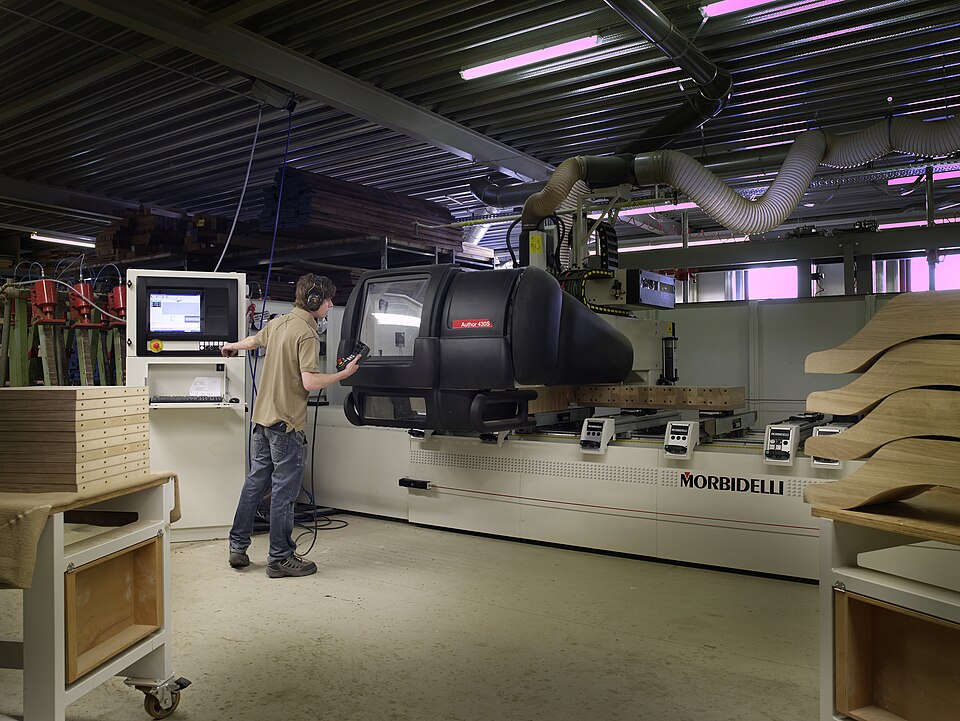 CNC machining center with operator